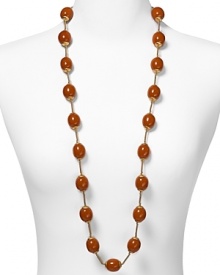 RJ Graziano channels '40s chic with this heirloom-haute beaded necklace. Egg-shaped caramel beads capped with gold tone hardware blend elegantly with a range of looks. RJ Graziano channels '40s chic with this heirloom-haute beaded necklace. Egg-shaped caramel beads capped with gold tone hardware blend elegantly with a range of looks.