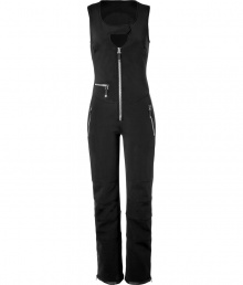Make a chic statement on the slopes in Jet Sets ultra modern stretch ski overalls, finished with a flattering cut guaranteed to show off your sporty side in style - Snapped scooped neckline, sleeveless, exposed front zip, zippered pockets, seamed knees, zippered ankles, inside elasticized cuff lining with silicon band for hold - Form fitting through the thigh, straight leg, slightly flared ankle - Wear with form-fitting turtlenecks and glamorous oversized sunglasses Make a chic statement on the slopes in Jet Sets ultra modern stretch ski overalls, finished with a flattering cut guaranteed to show off your sporty side in style - Snapped scooped neckline, sleeveless, exposed front zip, zippered pockets, seamed knees, zippered ankles, inside elasticized cuff lining with silicon band for hold - Form fitting through the thigh, straight leg, slightly flared ankle - Wear with form-fitting turtlenecks and glamorous oversized sunglasses