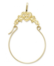 Keep all your favorite charms in place. This polished charm holder features a filigree heart design in 14k gold. Chain not included. Approximate length: 1-2/5 inches. Approximate width: 9/10 inch. Keep all your favorite charms in place. This polished charm holder features a filigree heart design in 14k gold. Chain not included. Approximate length: 1-2/5 inches. Approximate width: 9/10 inch.
