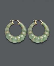 Good luck and great style combine in these unique hoop earrings. Crafted from solid jade (68 mm), earrings feature a bamboo-style pattern with 14k gold accents and backing. Approximate diameter: 1-1/2 inches. Good luck and great style combine in these unique hoop earrings. Crafted from solid jade (68 mm), earrings feature a bamboo-style pattern with 14k gold accents and backing. Approximate diameter: 1-1/2 inches.
