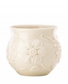 Already teeming with fresh blooms, the Floral Fields cachepot from Lenox has a serene, understated elegance in graceful ivory porcelain. A charming centerpiece! Qualifies for Rebate