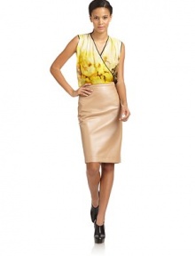 THE LOOKSheer constructionAllover floral printSurplice v-neck with mock wrap frontTHE FITAbout 21 from shoulder to hemTHE MATERIALSilkCARE & ORIGINDry cleanMade in USAModel shown is 5'9 (175cm) wearing US size 2. THE LOOKSheer constructionAllover floral printSurplice v-neck with mock wrap frontTHE FITAbout 21 from shoulder to hemTHE MATERIALSilkCARE & ORIGINDry cleanMade in USAModel shown is 5'9 (175cm) wearing US size 2.