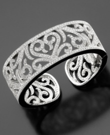 A stunning and sophisticated style: this sterling silver bracelet features round-cut diamonds (1 ct. t.w.) in a pretty swirl pattern for the perfect finishing touch. Diameter measures 2-1/2 inches. A stunning and sophisticated style: this sterling silver bracelet features round-cut diamonds (1 ct. t.w.) in a pretty swirl pattern for the perfect finishing touch. Diameter measures 2-1/2 inches.