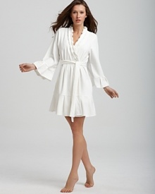 Indulge yourself with this plush three-quarter sleeve terry robe. Indulge yourself with this plush three-quarter sleeve terry robe.