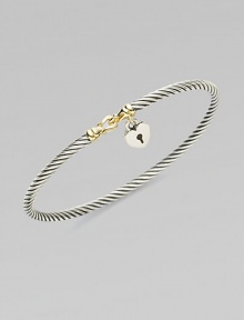 From the Cable Collectibles Collection. A thin sterling silver cable band with an 18K gold buckle and precious heart lock charm.18K gold Sterling silver Width, about 3mm Hook closure Imported From the Cable Collectibles Collection. A thin sterling silver cable band with an 18K gold buckle and precious heart lock charm.18K gold Sterling silver Width, about 3mm Hook closure Imported