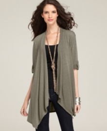 A perfect layer for transitioning weather! Wear this short-sleeve cardigan from Style&co. to add an angle of edge to your ensemble--an asymmetrical hem is an eye-catching feature! A perfect layer for transitioning weather! Wear this short-sleeve cardigan from Style&co. to add an angle of edge to your ensemble--an asymmetrical hem is an eye-catching feature!