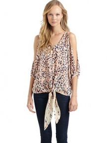 THE LOOKLeopard printV-neckCutout shouldersThree-quarter length dolman sleeves with banded cuffsTie-front waistTHE FITAbout 24 from shoulder to hemTHE MATERIALSilkContrast: rayonCARE & ORIGINDry cleanMade in USAModel shown is 5'8 (172½cm) wearing US size Small. THE LOOKLeopard printV-neckCutout shouldersThree-quarter length dolman sleeves with banded cuffsTie-front waistTHE FITAbout 24 from shoulder to hemTHE MATERIALSilkContrast: rayonCARE & ORIGINDry cleanMade in USAModel shown is 5'8 (172½cm) wearing US size Small.
