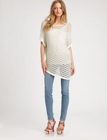 Finished with an asymmetrical hem that hits below the hips, this edgy mesh top completes the look with dropped shoulders and dolman sleeves. BoatneckDropped shouldersThree-quarter dolman sleevesAsymmetrical hem hits below the hips46% viscose/17% nylon/16% metallic/2% angora/2% wool/2% cashmereDry cleanImportedModel shown is 5'10 (177cm) wearing US size Small. Finished with an asymmetrical hem that hits below the hips, this edgy mesh top completes the look with dropped shoulders and dolman sleeves. BoatneckDropped shouldersThree-quarter dolman sleevesAsymmetrical hem hits below the hips46% viscose/17% nylon/16% metallic/2% angora/2% wool/2% cashmereDry cleanImportedModel shown is 5'10 (177cm) wearing US size Small.