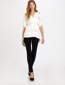 Delicate striped lace insets and a deep-V front define this airy tunic.Banded round necklineElbow-length sleeves with roll-tab cuffsPullover style with deep-v frontStriped lace insetsUneven side-vented hemSemi-sheer panelsAbout 26.5 from shoulder to hemPolyesterDry cleanImportedSIZE & FIT Model shown is 5'11 (180cm) wearing a US size Small. Delicate striped lace insets and a deep-V front define this airy tunic.Banded round necklineElbow-length sleeves with roll-tab cuffsPullover style with deep-v frontStriped lace insetsUneven side-vented hemSemi-sheer panelsAbout 26.5 from shoulder to hemPolyesterDry cleanImportedSIZE & FIT Model shown is 5'11 (180cm) wearing a US size Small.