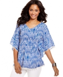 A vibrant print and feminine details mix marvelously on this Style&co. top, featuring a smocked empire waist and a flattering fit. A vibrant print and feminine details mix marvelously on this Style&co. top, featuring a smocked empire waist and a flattering fit.