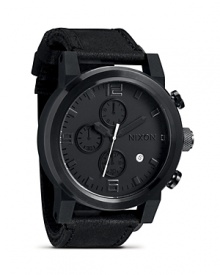 In a chronograph design, Nixon's The Ride watch mixes stainless steel with sleek leather for a look that makes a bold yet laid-back impression. In a chronograph design, Nixon's The Ride watch mixes stainless steel with sleek leather for a look that makes a bold yet laid-back impression.