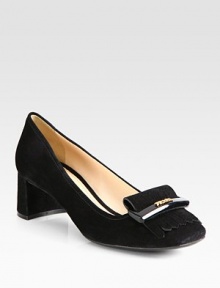 Suede block heel design with hardware and fringe detail. Suede heel, 1¾ (45mm)Suede upperLeather lining and rubber solePadded insoleImported Suede block heel design with hardware and fringe detail. Suede heel, 1¾ (45mm)Suede upperLeather lining and rubber solePadded insoleImported