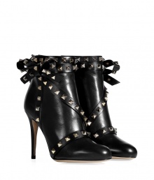 An ultra feminine take on the iconic Valentino look, these rockstud trimmed leather bow boots count as a covetable must - Round toe, back zip, oversized bow on outside with rockstud trim throughout, stiletto heel, rubber insert on sole for traction - Hits above the ankle - Wear with everything from slim fit trousers to tailored sheath dresses An ultra feminine take on the iconic Valentino look, these rockstud trimmed leather bow boots count as a covetable must - Round toe, back zip, oversized bow on outside with rockstud trim throughout, stiletto heel, rubber insert on sole for traction - Hits above the ankle - Wear with everything from slim fit trousers to tailored sheath dresses