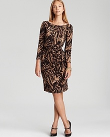 Graphic leaf print infuses a classic AK Anne Klein faux-wrap dress with modern sophistication. Garnish with gold accents for day-to-night polish. Graphic leaf print infuses a classic AK Anne Klein faux-wrap dress with modern sophistication. Garnish with gold accents for day-to-night polish.