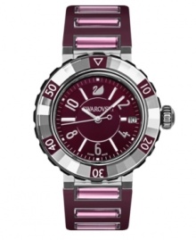 Who says you can't have it all? The Octea Sport watch by Swarovski is both glamorous and sporty. Purple rubber strap with six amethyst-colored crystals and round stainless steel case. Clear crystal rotating bezel. Purple sunray dial features applied silver tone numerals and stick indices, minute track, date window at three o'clock, luminous hands and logo. Swiss quartz movement. Water resistant to 30 meters. Two-year limited warranty. Who says you can't have it all? The Octea Sport watch by Swarovski is both glamorous and sporty. Purple rubber strap with six amethyst-colored crystals and round stainless steel case. Clear crystal rotating bezel. Purple sunray dial features applied silver tone numerals and stick indices, minute track, date window at three o'clock, luminous hands and logo. Swiss quartz movement. Water resistant to 30 meters. Two-year limited warranty.