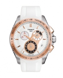 An watch of contrast by Tissot, the Veloci-T is as precisely functional as it is chic. White rubber strap and round stainless steel case. Goldtone PVD-plated bezel with tachymeter scale. White chronograph dial features goldtone stick indices, date window at four o'clock, luminous goldtone hands, black logo and three subdials accented in goldtone, black and red. Swiss movement. Water resistant to 100 meters. Two-year limited warranty. An watch of contrast by Tissot, the Veloci-T is as precisely functional as it is chic. White rubber strap and round stainless steel case. Goldtone PVD-plated bezel with tachymeter scale. White chronograph dial features goldtone stick indices, date window at four o'clock, luminous goldtone hands, black logo and three subdials accented in goldtone, black and red. Swiss movement. Water resistant to 100 meters. Two-year limited warranty.