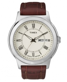 Complete a polished look with this handsome dress watch by Timex. Brown croc-embossed leather strap and round silver tone mixed metal case. Ivory dial features black Roman numerals at markers, printed minute track, day and date window at three o'clock, luminous hands, and logo. Quartz movement. Water resistant to 50 meters. One-year limited warranty. Complete a polished look with this handsome dress watch by Timex. Brown croc-embossed leather strap and round silver tone mixed metal case. Ivory dial features black Roman numerals at markers, printed minute track, day and date window at three o'clock, luminous hands, and logo. Quartz movement. Water resistant to 50 meters. One-year limited warranty.