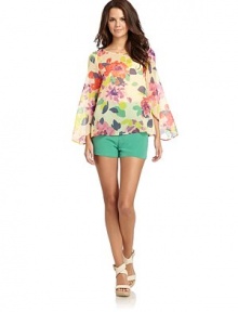 THE LOOKSheer designFloral printRound necklineLong open back sleeves Single back button closureOpen cutaway backTHE FITAbout 23 from shoulder to hemTHE MATERIALSilkCARE & ORIGINDry cleanImportedModel shown is 5'10 (177cm) wearing US size Small. THE LOOKSheer designFloral printRound necklineLong open back sleeves Single back button closureOpen cutaway backTHE FITAbout 23 from shoulder to hemTHE MATERIALSilkCARE & ORIGINDry cleanImportedModel shown is 5'10 (177cm) wearing US size Small.