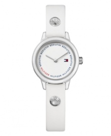 There's no mistaking classic Tommy Hilfiger style. Watch crafted of white leather strap with two logo-etched silver tone buttons and round stainless steel case with white bezel. White dial features two silver tone hands, flag logo at three o'clock and blue and red text logo ring. Quartz movement. Water resistant to 30 meters. Ten-year limited warranty. There's no mistaking classic Tommy Hilfiger style. Watch crafted of white leather strap with two logo-etched silver tone buttons and round stainless steel case with white bezel. White dial features two silver tone hands, flag logo at three o'clock and blue and red text logo ring. Quartz movement. Water resistant to 30 meters. Ten-year limited warranty.