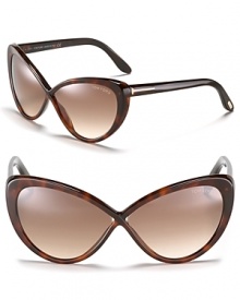 The classic cat eye gets a modern update with a crisscross frame and gradient lenses. The classic cat eye gets a modern update with a crisscross frame and gradient lenses.