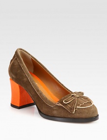 A vivid lizard-print leather heel modernizes this suede pump, topped with a traditional fringe kiltie. Lizard-print leather heel, 2½ (65mm)Suede upperLeather lining and solePadded insoleMade in Italy A vivid lizard-print leather heel modernizes this suede pump, topped with a traditional fringe kiltie. Lizard-print leather heel, 2½ (65mm)Suede upperLeather lining and solePadded insoleMade in Italy