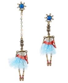 Dance till your dead. Betsey Johnson's eery earring style features sweet skeletons dressed as ballerinas. Crafted from antique gold-plated mixed metal with a blue crystal post, crystal cup chain accent and red belt and blue tutu details. Approximate drops: 2-3/4 inches and 4-1/4 inches. Dance till your dead. Betsey Johnson's eery earring style features sweet skeletons dressed as ballerinas. Crafted from antique gold-plated mixed metal with a blue crystal post, crystal cup chain accent and red belt and blue tutu details. Approximate drops: 2-3/4 inches and 4-1/4 inches.