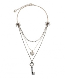 Sweet layers of femininity for the blossoming fashionista. Another innovative design by Betsey Johnson - necklace features ribbon accents with a sparkling strand of crystal, a crystal coated heart charm, and a black-plated crystal key. Necklace crafted in antique silver tone mixed metal. Approximate length: 16 inches + 3-inch extender. Approximate drop: 1-3 inches. Sweet layers of femininity for the blossoming fashionista. Another innovative design by Betsey Johnson - necklace features ribbon accents with a sparkling strand of crystal, a crystal coated heart charm, and a black-plated crystal key. Necklace crafted in antique silver tone mixed metal. Approximate length: 16 inches + 3-inch extender. Approximate drop: 1-3 inches.