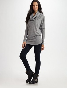 Wool-rich cowlneck with long dolman sleeves and a touch of cashmere. Cowlneck Long dolman sleeves Longer length hits below the hips 75% wool/20% stretch polyester/5% cashmere Hand wash ImportedModel shown is 5'10½ (179cm) wearing US size Small. Wool-rich cowlneck with long dolman sleeves and a touch of cashmere. Cowlneck Long dolman sleeves Longer length hits below the hips 75% wool/20% stretch polyester/5% cashmere Hand wash ImportedModel shown is 5'10½ (179cm) wearing US size Small.