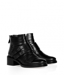 Rocker-chic looks get a decidedly luxe remix in Givenchys black leather ankle boots, complete with an ultra cool strappy buckled front and edgy chunky heel - Rounded toe, double buckled strap, back zip, stitched welt, stacked leather heel - Pair with modern cashmere dresses or favorite skinnies and chunky knits Rocker-chic looks get a decidedly luxe remix in Givenchys black leather ankle boots, complete with an ultra cool strappy buckled front and edgy chunky heel - Rounded toe, double buckled strap, back zip, stitched welt, stacked leather heel - Pair with modern cashmere dresses or favorite skinnies and chunky knits