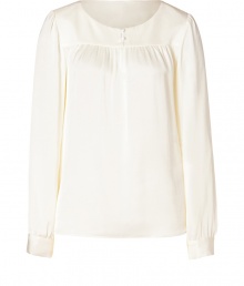 Ultra-sophisticated top in fine, natural white silk - Narrow silhouette with round neck and long, billowing sleeves - Decorative buttons - Fits looks for the office with a pencil skirt and blazer, and causal styles with jeans and flats Ultra-sophisticated top in fine, natural white silk - Narrow silhouette with round neck and long, billowing sleeves - Decorative buttons - Fits looks for the office with a pencil skirt and blazer, and causal styles with jeans and flats