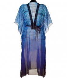 Luxurious caftan of a fine, blue patterned cotton-silk blend - Glamorous and elegant in a slightly transparent style - Features feminine, embroidered V-neckline, batwing sleeves, and flattering waist belt - Fashionable for the beach, at parties or events, with a bikini and thongs, or with flowing pants, tank, and sexy heels Luxurious caftan of a fine, blue patterned cotton-silk blend - Glamorous and elegant in a slightly transparent style - Features feminine, embroidered V-neckline, batwing sleeves, and flattering waist belt - Fashionable for the beach, at parties or events, with a bikini and thongs, or with flowing pants, tank, and sexy heels