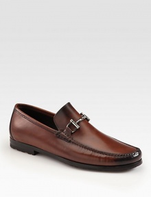 Equestrian-inspired bit defines this Italian leather loafer. Suede upperLeather liningPadded insoleRubber soleMade in Italy Equestrian-inspired bit defines this Italian leather loafer. Suede upperLeather liningPadded insoleRubber soleMade in Italy