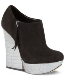 Walk proudly in this knock-out style by Boutique 9. The Elister booties feature a thick platform and tall covered heel with gold metal trim. Walk proudly in this knock-out style by Boutique 9. The Elister booties feature a thick platform and tall covered heel with gold metal trim.