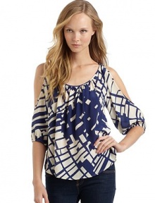 THE LOOKLarge pixel printScoopneckCutout shouldersThree-quarter length sleeves with elastic cuffsCurved hemTHE FITAbout 25 from shoulder to hemTHE MATERIALSilkCARE & ORIGINDry cleanMade in USAModel shown is 5'8 (172½cm) wearing US size Small. THE LOOKLarge pixel printScoopneckCutout shouldersThree-quarter length sleeves with elastic cuffsCurved hemTHE FITAbout 25 from shoulder to hemTHE MATERIALSilkCARE & ORIGINDry cleanMade in USAModel shown is 5'8 (172½cm) wearing US size Small.