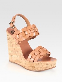 Rich leather style with an adjustable slingback, a natural cork wedge and braided leather straps. Cork wedge, 5 (125mm)Covered platform, 1½ (40mm)Compares to a 3½ heel (90mm)Leather upperLeather liningRubber soleImportedOUR FIT MODEL RECOMMENDS ordering one half size up as this style runs small. Rich leather style with an adjustable slingback, a natural cork wedge and braided leather straps. Cork wedge, 5 (125mm)Covered platform, 1½ (40mm)Compares to a 3½ heel (90mm)Leather upperLeather liningRubber soleImportedOUR FIT MODEL RECOMMENDS ordering one half size up as this style runs small.