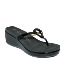 The Willow EVA platform thong sandals by Calvin Klein take casual to chic. A comfortable choice for a striking finishing touch. The Willow EVA platform thong sandals by Calvin Klein take casual to chic. A comfortable choice for a striking finishing touch.