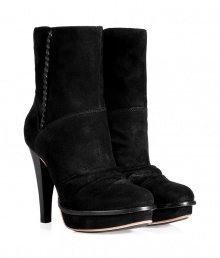 Inject urban attitude into your look with UGG Australias jet black suede ankle boots, an ultra cool choice perfect for taking from day into night - Rounded toe, gathered front detail, inside zip, stitched welt, covered platform, stacked heel - Hits above the ankle - Wear with favorite skinnies, cool modern knits, and matching black accessories Inject urban attitude into your look with UGG Australias jet black suede ankle boots, an ultra cool choice perfect for taking from day into night - Rounded toe, gathered front detail, inside zip, stitched welt, covered platform, stacked heel - Hits above the ankle - Wear with favorite skinnies, cool modern knits, and matching black accessories