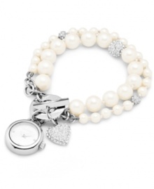 The pearl of your collection: this pretty pearl-wrapped timepiece from Carolee will steal your heart at first sight. The pearl of your collection: this pretty pearl-wrapped timepiece from Carolee will steal your heart at first sight.