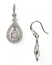 Intricately detailed with crystals, Carolee's looped earrings are a sophisticated take on the classic teardrop. Style with jeans and a blazer -- this pair makes casual staples shine. Intricately detailed with crystals, Carolee's looped earrings are a sophisticated take on the classic teardrop. Style with jeans and a blazer -- this pair makes casual staples shine.
