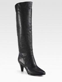An ultra-tall design of buttery suede on a stacked heel. Stacked heel, 3 (75mm)Shaft, 17Leg circumference, 15Suede upperPull-on styleLeather lining and solePadded insoleImported