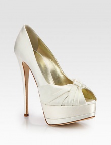 A tall, platform silhouette of elegantly ruched satin with a peep toe is eternally chic. Self-covered heel, 5½ (140mm)Covered platform, 1½ (40mm)Compares to a 4 heel (100mm)Satin upperPeep toeLeather lining and solePadded insoleMade in Italy A tall, platform silhouette of elegantly ruched satin with a peep toe is eternally chic. Self-covered heel, 5½ (140mm)Covered platform, 1½ (40mm)Compares to a 4 heel (100mm)Satin upperPeep toeLeather lining and solePadded insoleMade in Italy