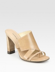 Flawless leather slide has a natural wooden heel and an unexpected thong front. Wooden heel, 3½ (90mm)Leather upperLeather lining and solePadded insoleMade in ItalyOUR FIT MODEL RECOMMENDS ordering one half size up as this style runs small. Flawless leather slide has a natural wooden heel and an unexpected thong front. Wooden heel, 3½ (90mm)Leather upperLeather lining and solePadded insoleMade in ItalyOUR FIT MODEL RECOMMENDS ordering one half size up as this style runs small.