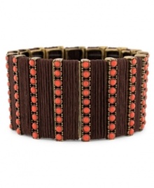 Spice up your style with this coral detailed design from Jessica Simpson. A bronze stretch design with coral bead accents. Approximate length: 8-3/4 inches. Approximate diameter: 2-1/2 inches. Spice up your style with this coral detailed design from Jessica Simpson. A bronze stretch design with coral bead accents. Approximate length: 8-3/4 inches. Approximate diameter: 2-1/2 inches.