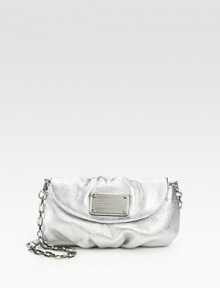 A convertible silhouette of soft and slouchy metallic leather with a chic chain and leather strap.Removable shoulder strap, 22 dropMagnetic flap closureSix credit card slotsFully lined9¼W X 5¼H X 3/4DImported A convertible silhouette of soft and slouchy metallic leather with a chic chain and leather strap.Removable shoulder strap, 22 dropMagnetic flap closureSix credit card slotsFully lined9¼W X 5¼H X 3/4DImported