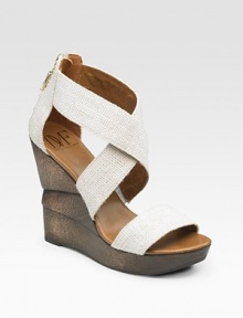 Burlap straps cross over a wooden wedge for contrast.Wooden wedge, 4½ (115mm) Wooden platform, 1 (25mm) Compares to a 3½ heel (90mm) Open toe Back zipper Leather lining Padded insole Rubber sole ImportedOUR FIT MODEL RECOMMENDS ordering true size.. Burlap straps cross over a wooden wedge for contrast.Wooden wedge, 4½ (115mm) Wooden platform, 1 (25mm) Compares to a 3½ heel (90mm) Open toe Back zipper Leather lining Padded insole Rubber sole ImportedOUR FIT MODEL RECOMMENDS ordering true size..