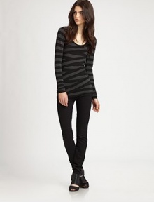 Asymmetrical contrast panels crisscross to create flattering stripes and a trend-forward bandage effect that visually slims the torso. ScoopneckLong sleevesLonger length hits below the hips94% rayon/6% spandexDry cleanMade in USAModel shown is 5'9½ (176cm) wearing US size Small. Asymmetrical contrast panels crisscross to create flattering stripes and a trend-forward bandage effect that visually slims the torso. ScoopneckLong sleevesLonger length hits below the hips94% rayon/6% spandexDry cleanMade in USAModel shown is 5'9½ (176cm) wearing US size Small.