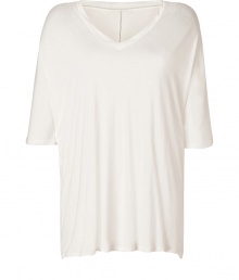 With a cool oversized silhouette and ultra soft feel, Steffen Schrauts tee lends an effortless chic edge to your outfit - V-neckline, elbow-length dolman sleeves, longer back - Loose, oversized fit - Wear with leather leggings, booties and chunky jewelry With a cool oversized silhouette and ultra soft feel, Steffen Schrauts tee lends an effortless chic edge to your outfit - V-neckline, elbow-length dolman sleeves, longer back - Loose, oversized fit - Wear with leather leggings, booties and chunky jewelry