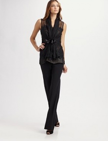 Whisper-light chiffon, generously trimmed in lace and secured with a satiny ribbon tie.Shawl collarSleevelessSatin front tieAllover lace trimAttached ribbon tieIncluded silk camisoleAbout 28 from shoulder to hem75% cotton/25% nylonMade in USA of French fabricDry cleanModel shown is 5'11 (180cm) wearing US size 4. Whisper-light chiffon, generously trimmed in lace and secured with a satiny ribbon tie.Shawl collarSleevelessSatin front tieAllover lace trimAttached ribbon tieIncluded silk camisoleAbout 28 from shoulder to hem75% cotton/25% nylonMade in USA of French fabricDry cleanModel shown is 5'11 (180cm) wearing US size 4.