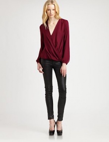 Crossover v-neck of pure silk has long bishop sleeves and inimitable asymmetrical draping. Crossover v-neckHook-and-eye closureLong bishop sleevesButtoned cuffsCropped back hemAbout 25 from shoulder to hem70% viscose/30% cottonDry cleanImportedModel shown is 5'11 (178cm) wearing US size Small. Crossover v-neck of pure silk has long bishop sleeves and inimitable asymmetrical draping. Crossover v-neckHook-and-eye closureLong bishop sleevesButtoned cuffsCropped back hemAbout 25 from shoulder to hem70% viscose/30% cottonDry cleanImportedModel shown is 5'11 (178cm) wearing US size Small.