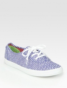 Abstract stripes modernize this stretchy canvas classic with a lace-up front. Canvas upperCanvas liningRubber solePadded insoleImported Abstract stripes modernize this stretchy canvas classic with a lace-up front. Canvas upperCanvas liningRubber solePadded insoleImported